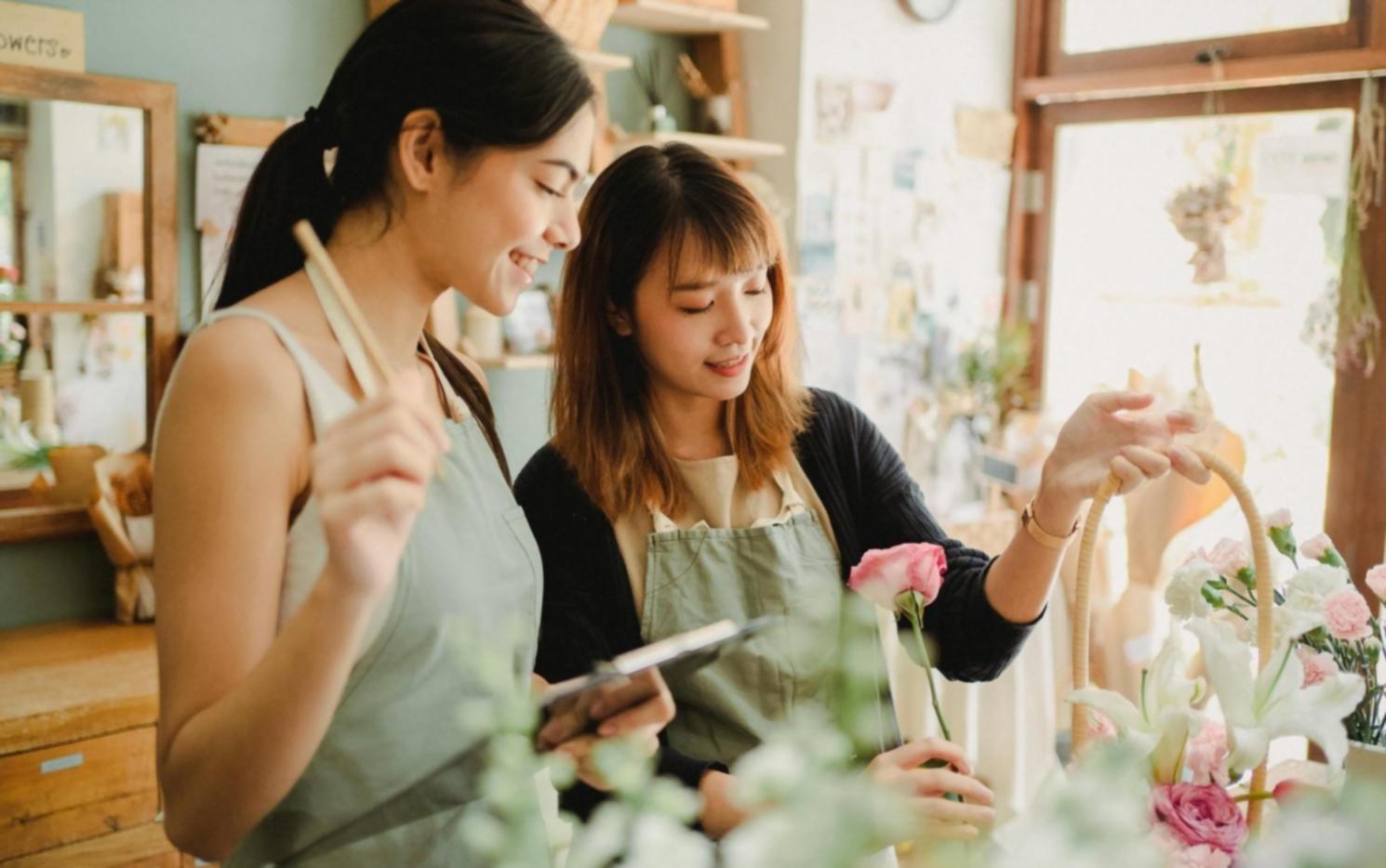 Team member arranging sustainable event florals